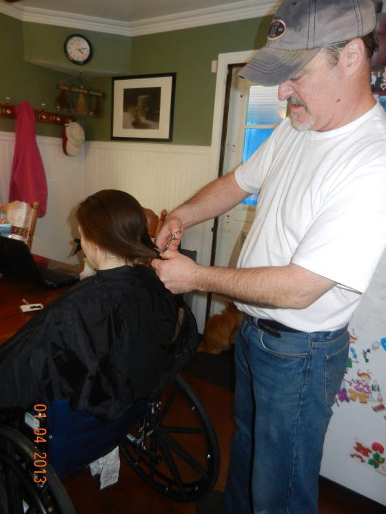 My dad had the honors of cutting my tied hair.